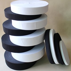 Elastic woven ribbon on rolls